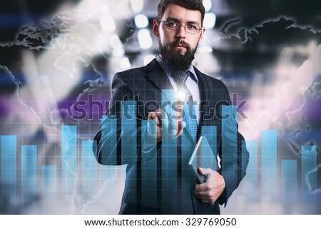 Businessman touching virtual screen with graph. Business, internet, technology concept.