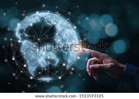Businessman touching to virtual world with connection line for global networks and technology linkage concept.
