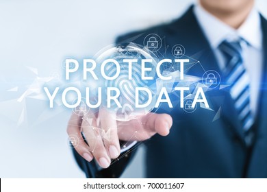 A businessman is touching a word with an abstract future background. Compute science, technology, business, internet concept. Protect your data. - Powered by Shutterstock