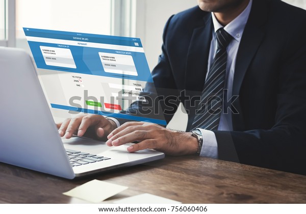 Businessman\
transferring money with internet online e-banking on laptop\
computer with virtual screen\
effect