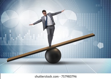 Businessman Trying Balance On Ball Seesaw Stock Photo 772176793 ...