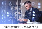 Businessman typing on laptop, double exposure online documentation system and business files storage. Concept of database and data security