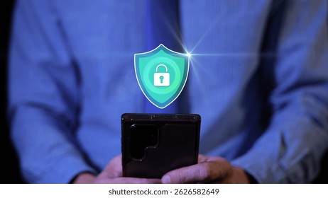 Businessman typing on phone with animated 3D cybersecurity hologram icon. Data protection concept