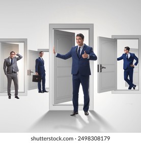 Businessman in uncertainty concept with many doors - Powered by Shutterstock