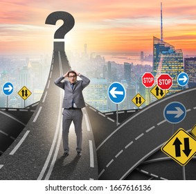 Businessman In Uncertainty Concept On Road Intersection Crossroa