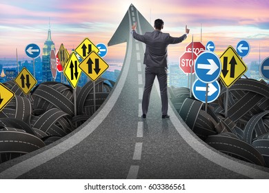 Businessman In Uncertainty Concept On Road Intersection Crossroa