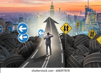 Businessman In Uncertainty Concept On Road Intersection Crossroa