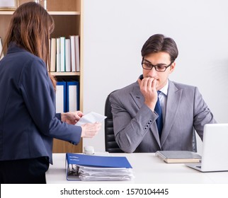 Businessman in unethical business concept with bribe - Shutterstock ID 1570104445