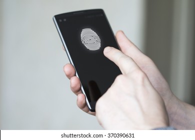 Businessman unlocked phone fingerprint