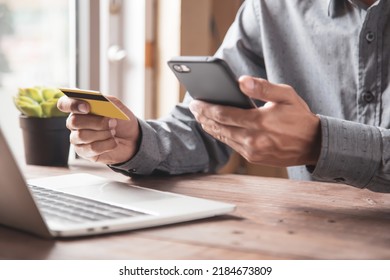 Businessman use credit card to spend money or pay for goods and online services.