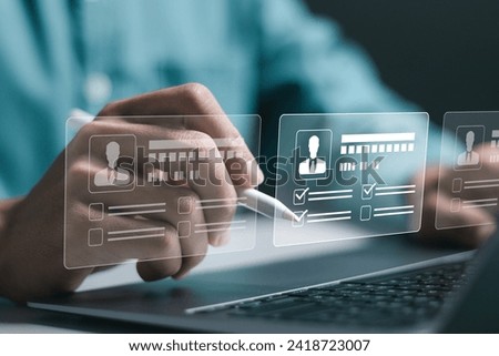 Businessman use laptop to checking resume for employee recruitment. Screening employee information and job applicants. HR, Human resource management concept.
