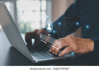 Businessman use laptop login register username and password identity on webpage concepts of cyber security, internet access, join social or personal data protection or forget pass key unlock.