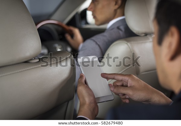 Businessman Use Mobile Inside\
Car