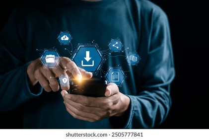 Businessman use smartphone with download icons on virtual screen. Download organizational information or documents. Data Storage, cloud storage technology. - Powered by Shutterstock - Get 15% off with code: PIKWIZARD15