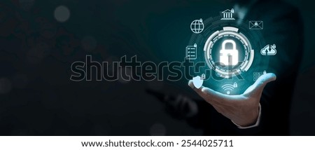 Businessman use smartphone and hold virtual screen Cyber security system. Data Protection Information privacy antivirus virus defence internet technology concept.
