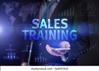 Businessman Use Smartphone And Selecting Sales Training, Touch Screen. Virtual Icon. Graphs Interface. Business Concept. Internet Concept. Digital Interfaces