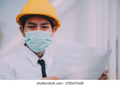 Businessman Use Surgical Mask On Site Construction 