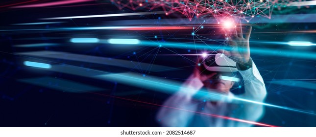 
Businessman Use VR Virtual Reality Goggle And Metaverse Technology On Global Networking Connecting And Generated Environment Between User And Augmented Reality And Virtual Reality On Social Network.