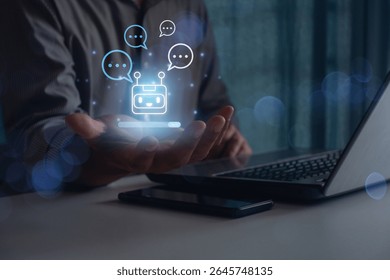 Businessman uses smartphone and laptop to interact with AI chatbot, symbolizing virtual assistant technology, digital communication, customer support, and artificial intelligence in modern business.
