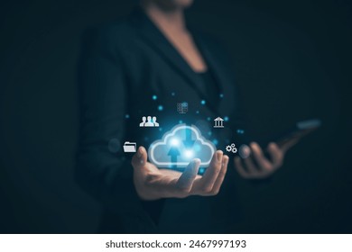 Businessman uses a tablet. Cloud computing disk is displayed on his hand. cloud technology Data storage Concept of internet service network and financial data transfe