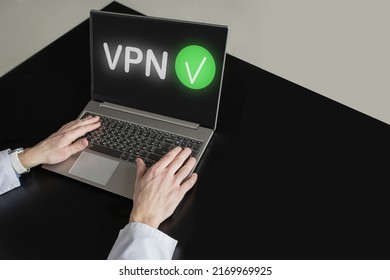 Businessman Uses VPN On Laptop. Data Encryption, IP Replacement, Secure Connection Concept. Cyber Security And Privacy, Protection Of Personal Information