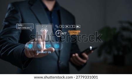 Businessman using AI chatbot interface for customer service support, representing artificial intelligence assistant, online communication, automation technology and 24 hours digital support solutions.