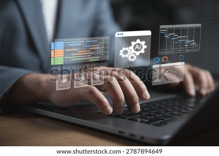 Businessman using AI powered analytics dashboard on laptop for workflow automation, project management, smart reporting, digital productivity optimization. Artificial intelligence business technology
