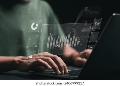 Businessman using analytics data KPI technology and data management system. Corporate strategy for finance, operations, sales, marketing.