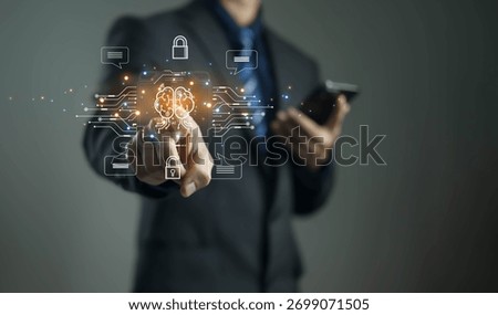 Businessman using artificial intelligence technology and data security system for digital innovation, cybersecurity, and smart business solutions in the modern virtual world.