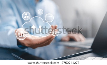 Businessman using Cloud computing service to secure data synchronization concept for online file storage, upload, backup, sync data, download transfer, and remote access services.