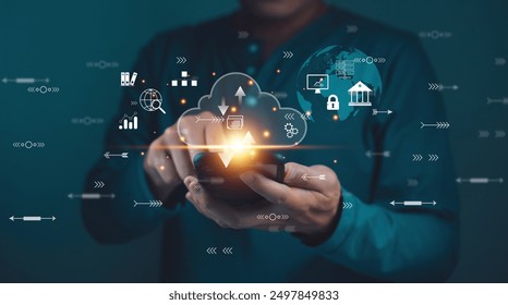 Businessman using cloud computing technology on a mobile device with virtual icons representing data management, innovation, and digital transformation. - Powered by Shutterstock