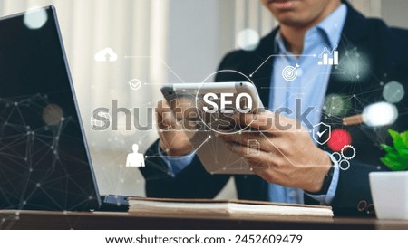 Businessman using a computer for analysis SEO Search Engine Optimization Marketing Ranking Traffic Website Internet Business Technology Concept.