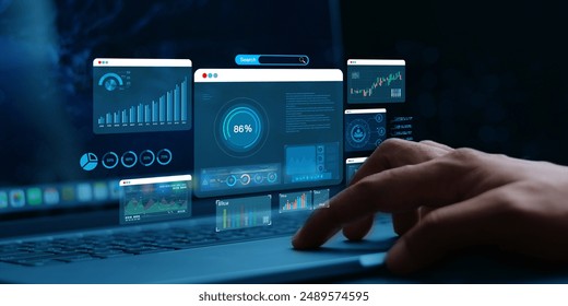 Businessman using computer for development and Analytics Data technology management System for report marketing strategy planning. graph analysis and information on a futuristic virtual screen. - Powered by Shutterstock