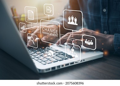 Businessman using a computer to document Change management in organization and business concept with consultant presenting icons of strategy. Organizational transition and transformation