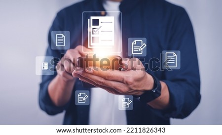 Businessman using computer Document Management System (DMS), online documentation database process automation to efficiently manage files