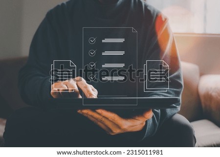Businessman using a computer to document management concept, online documentation database and digital file database technology, file access, doc sharing.storage