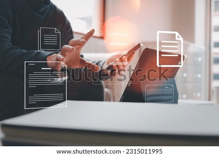 Businessman using a computer to document management concept, online documentation database and digital file database technology, file access, doc sharing.storage