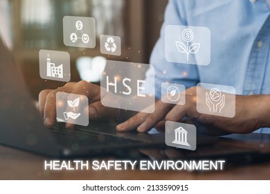 Businessman Using A Computer To HSE - Health Safety Environment Acronym Banner Web Icon For Business And Organization. Standard Safe Industrial Work And Industrial. Poster Design.
