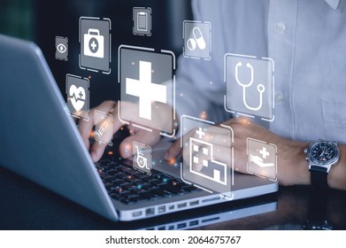 Businessman Using A Computer To Insurance Health Concept. Health Insurance Business Online And Healthcare.