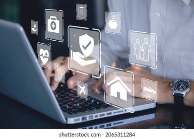 Businessman using a computer to insurance online for car, travel, family and life, financial and health insurance. Insurance concept.