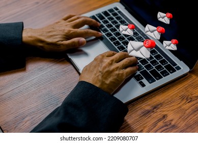 businessman using computer laptop and checking email icon 3D online or sending mail to partner and customer on web with virtual interface technology concept.