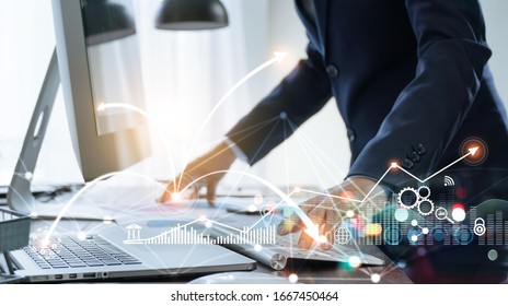 Businessman using computer and laptop, Management global structure networking and data exchanges customer connection on workplace, Business technology and digital marketing network concept.
