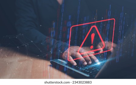Businessman using computer laptop with triangle caution warning sign for notification error and maintenance concept, cyber security, hacker attacks and hacking data, Ransomware, Phishing, Spyware. - Powered by Shutterstock - Get 15% off with code: PIKWIZARD15