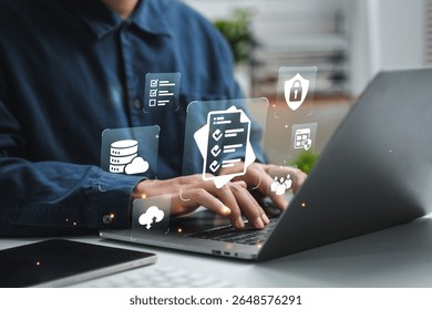 Businessman using computer to record document management concept, online document database and digital file storage system or software, record keeping, database technology, file access.