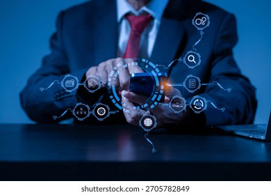 Businessman using computer, smartphone and presses his finger on the virtual screen inscription Hosting on desk, Web hosting concept, Internet, business, digital technology concept.