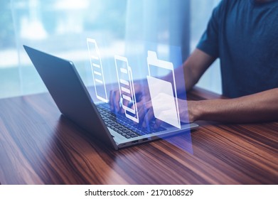 Businessman using computer Software for security, searching and managing corporate files, Corporate data management system and document management system with employee privacy. - Shutterstock ID 2170108529