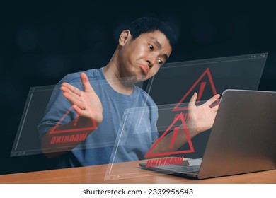 Businessman using computer with triangle caution warning sign for notification error. Notification error and maintenance, Programmer with hacker attacks, cyber crime and security.