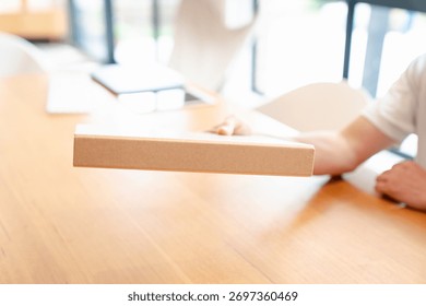 Businessman using data folder paper work siting on table in modern home office 
