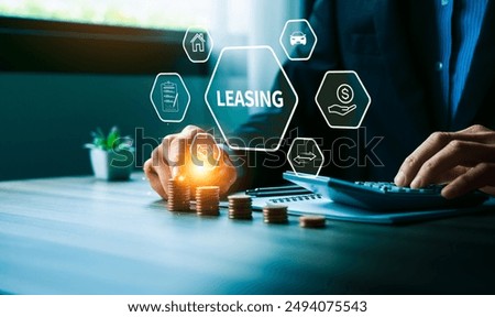 Businessman Using Digital Interface to Analyze Leasing Options and Financial Agreements for Property and Vehicles, Featuring Icons for Finance, Contract Management, and Investment Planning