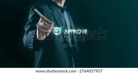 Businessman using a digital interface to approve documents with a glowing checkmark symbol, representing workflow management, validation, and decision-making in a modern corporate technology.